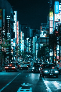 A street-side scene from Japan with billboards; our Japan translators understand the language well